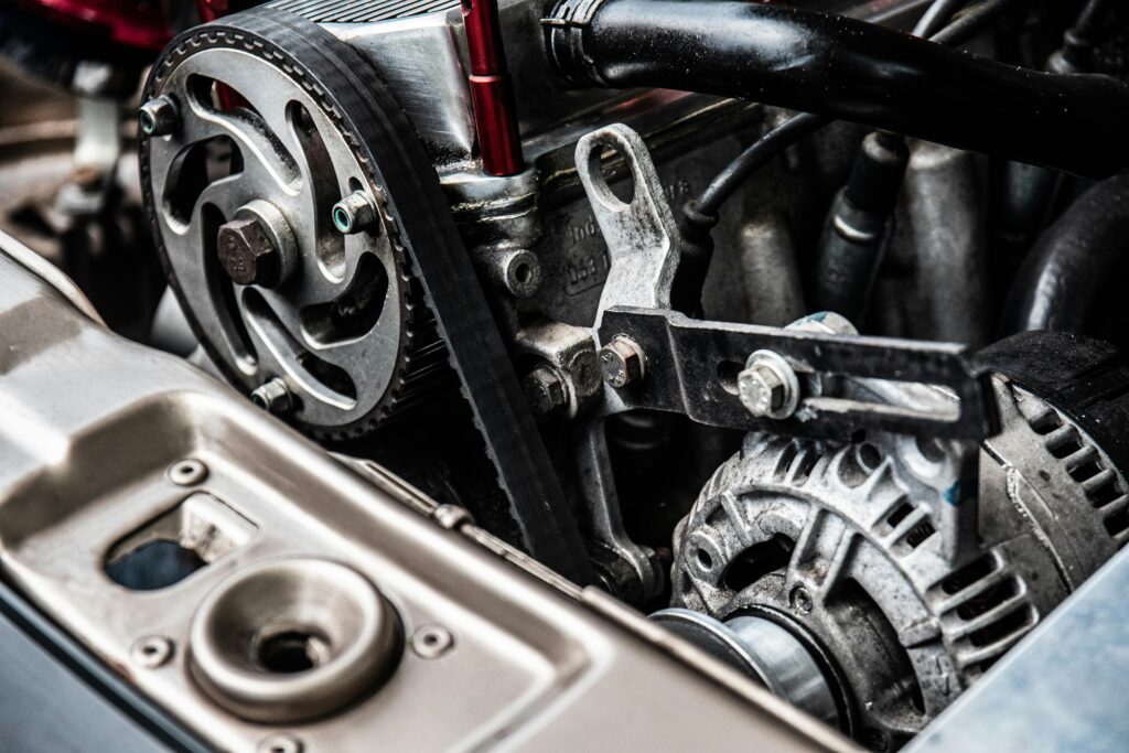 pexels-photo-3757226-3757226 Close-up Photo of Black and Silver Car Engine