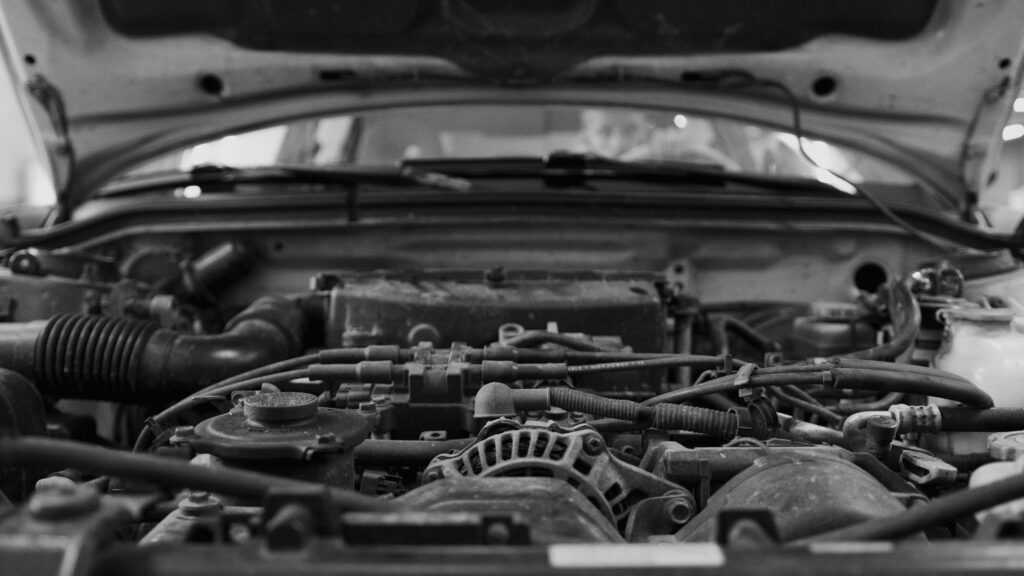 pexels-photo-8985708-8985708 Grayscale Photo of an Engine Bay